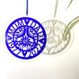 Sapphire blue acrylic anniversary decoration featuring “Mum & Dad,” two lovebirds, floral details, and the years 1980–2025 with “45” in the center. This elegant cut-out ornament hangs on a blue ribbon against a soft pink background, making it a perfect 45th wedding anniversary keepsake or gift.